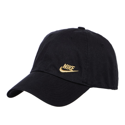 black nike hat with gold swoosh