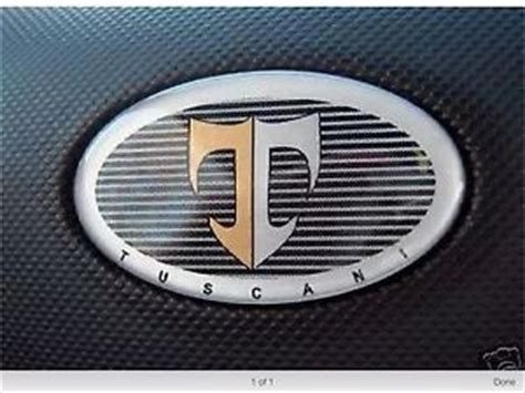 Автомобиль на букву т. Марка Тибурон. Hyundai Tiburon значок. Значок Hyundai Tuscani. Марка автомобиля с буквой т.